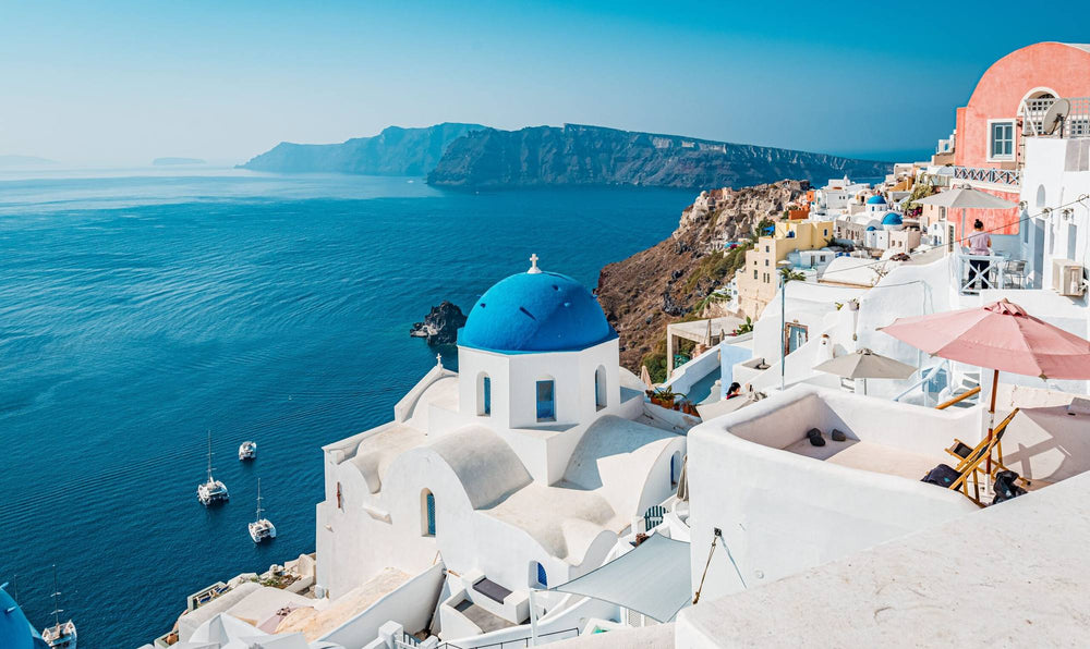 Santorini, white cliffs above caldera blue